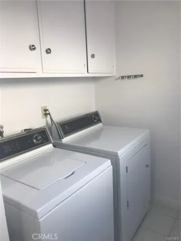 a bathroom with a toilet sink and vanity
