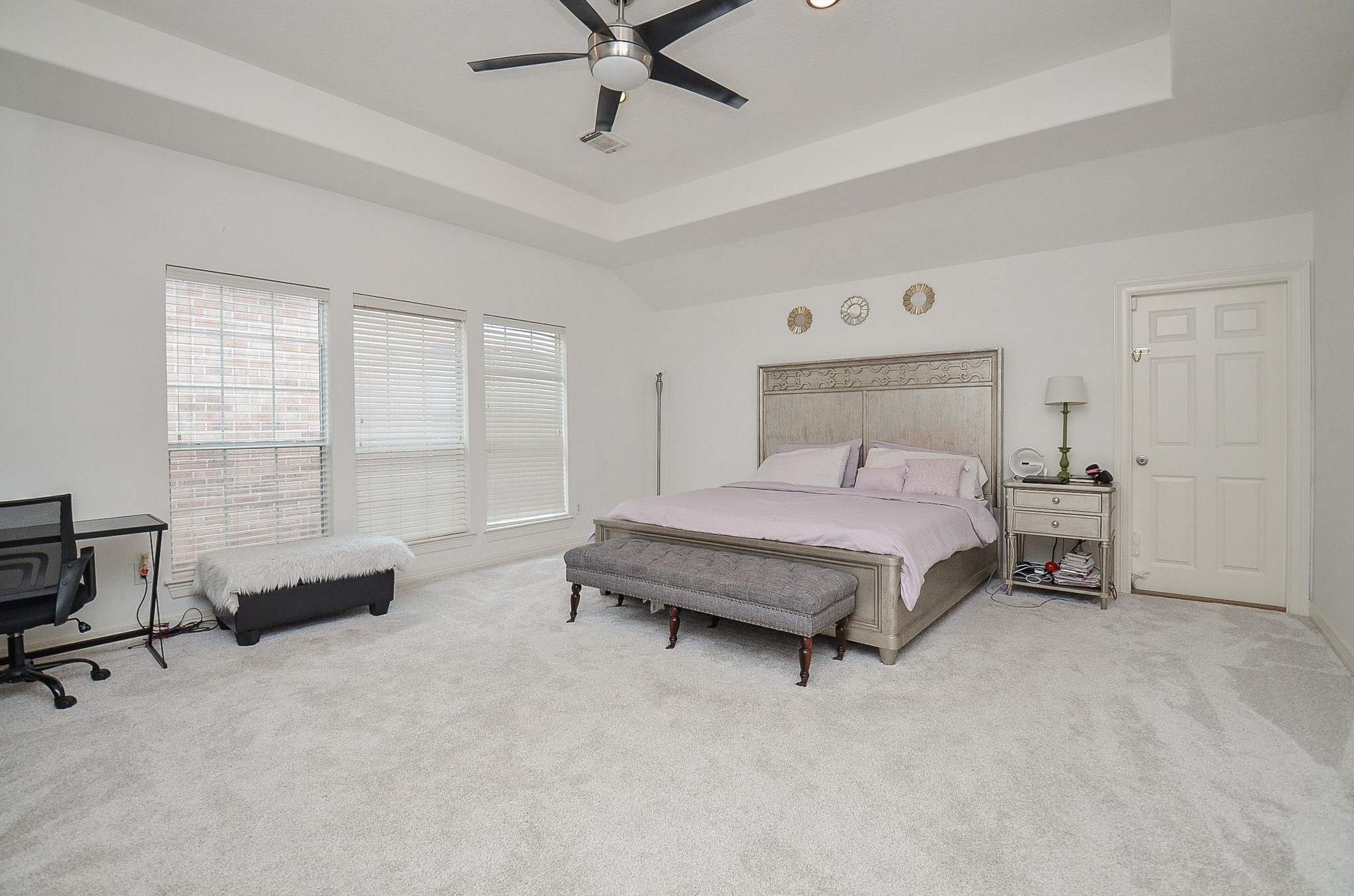 13511 Brookbluff Lane Houston, TX 77077 - Photo 13 of 16 a bedroom with a bed and furniture