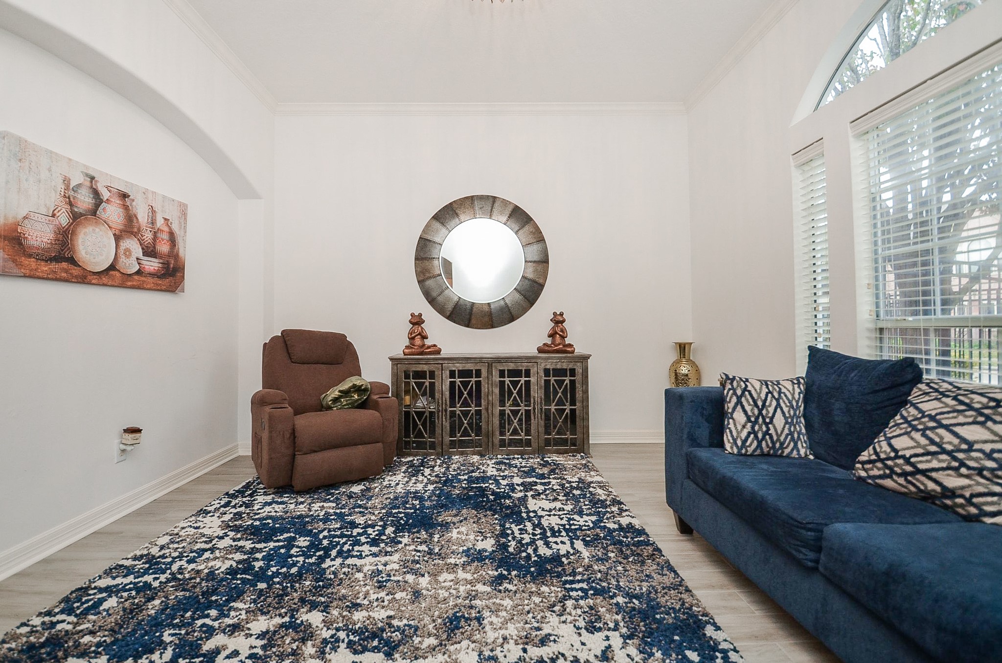13511 Brookbluff Lane Houston, TX 77077 - Photo 5 of 16 a living room with furniture and a large window