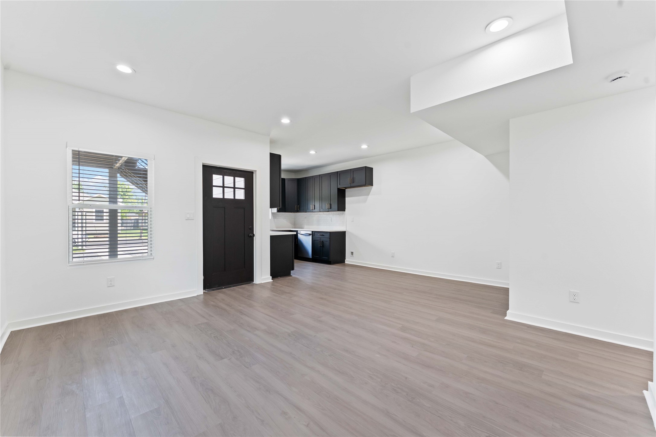 414 North Carolina Street, Unit A Houston, TX 77029 - Photo 10 of 25 a view of a kitchen with a sink and a window