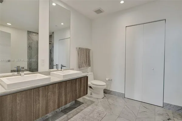 a spacious bathroom with a tub and a shower
