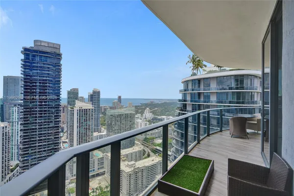 a balcony with a city view