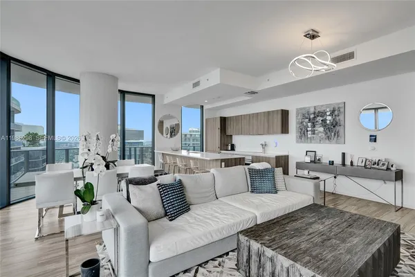 a living room with furniture and a table