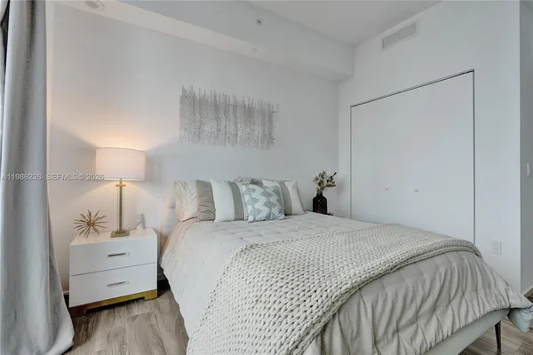 a en suite bathroom with a sink and a mirror