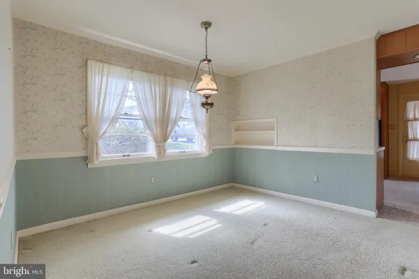 a kitchen with a refrigerator sink and stove