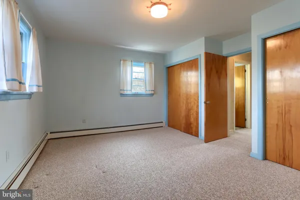 a bathroom with a sink a toilet and a bathtub