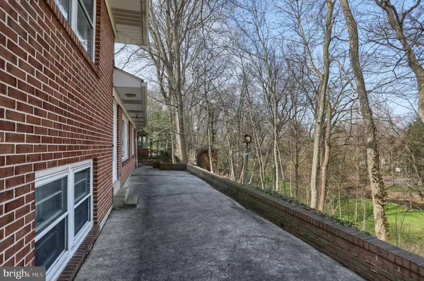 a view of a garden with a patio