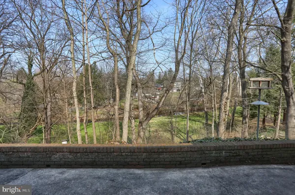 a aerial view of a residential apartment building with a yard