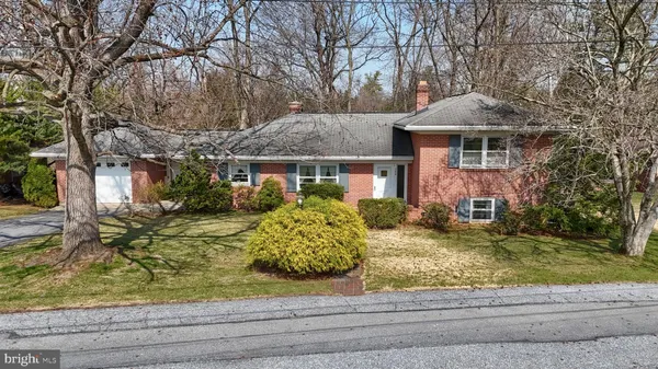 a view of swimming pool next to a yard