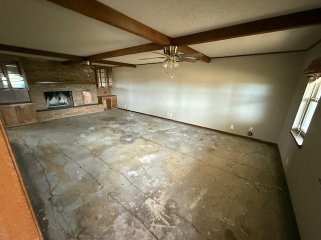 303 New Highland Road Springtown, TX 76082 - Photo 12 of 19 a view of empty room with a fireplace
