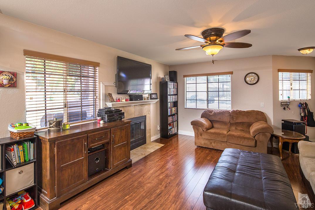 1175 Fitzgerald Road, Unit A Simi Valley, CA 93065 - Photo 4 of 16 a living room with furniture and a large window