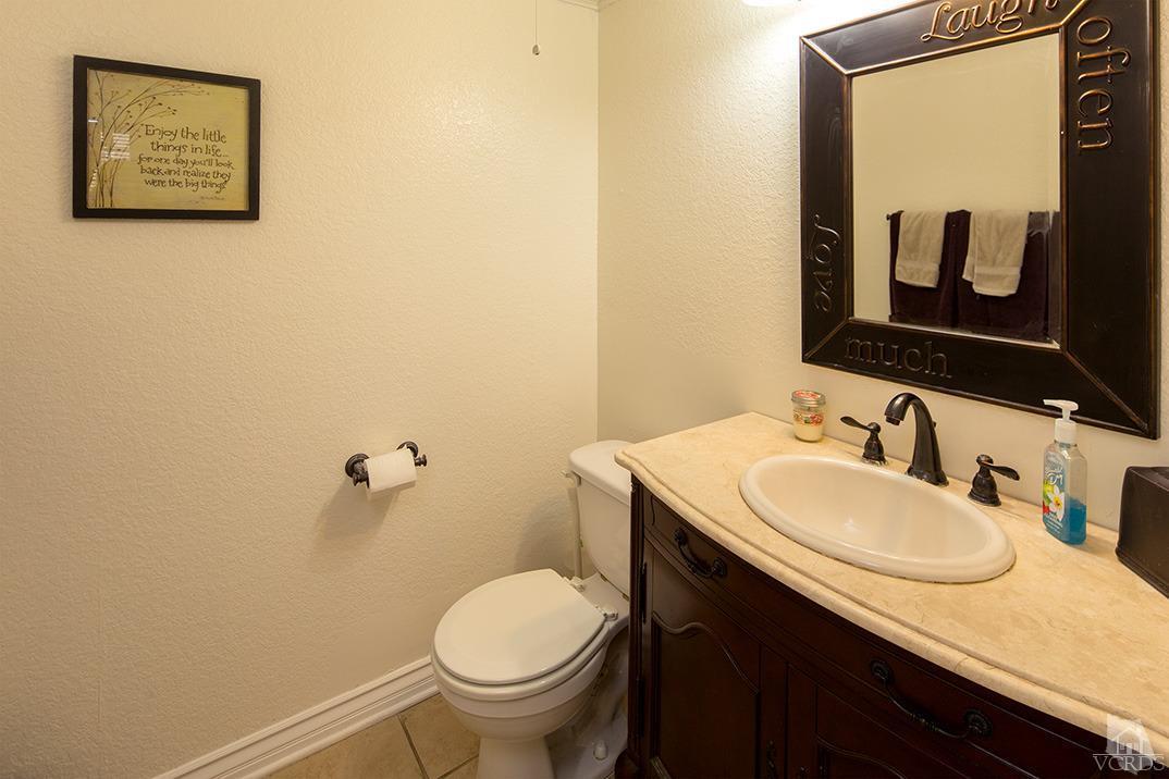 1175 Fitzgerald Road, Unit A Simi Valley, CA 93065 - Photo 9 of 16 a bathroom with a sink and a toilet