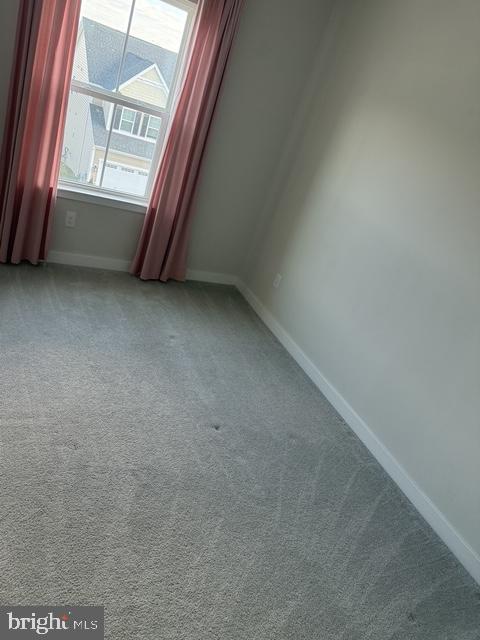 711 Quarry Point Road Malvern, PA 19355 - Photo 17 of 26 a view of an empty room with a window