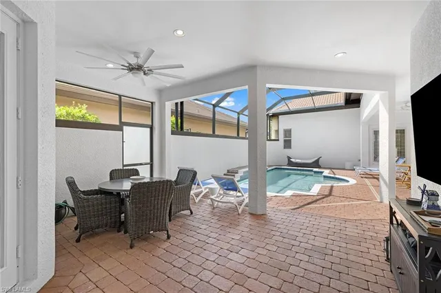 a workspace with furniture and window