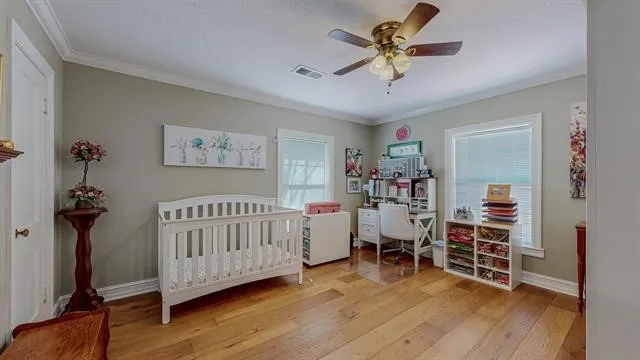 a view of a livingroom with furniture and wooden floor