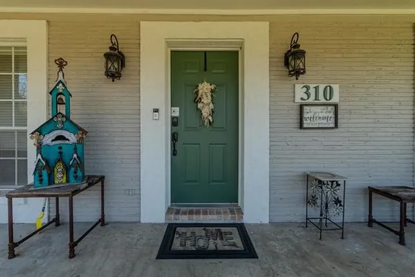 a view of a entryway door of the house