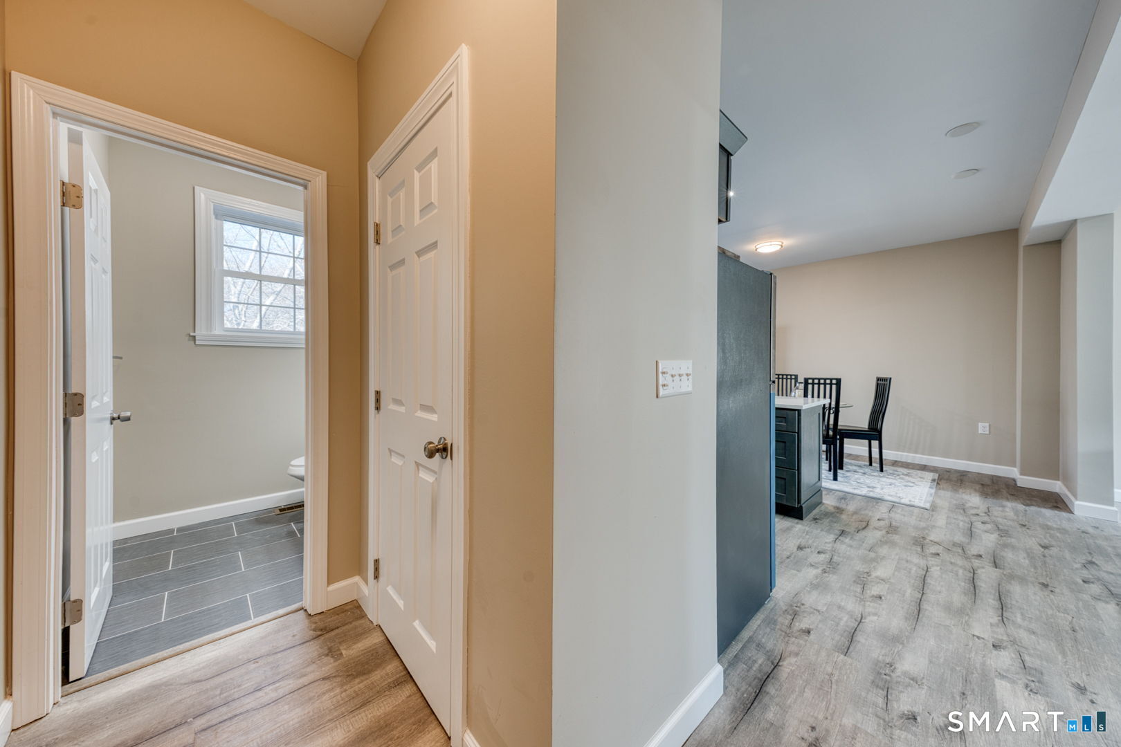 205 Winding Hollow Road Groton, CT 06340 - Photo 11 of 27 a view of a hallway and dining room