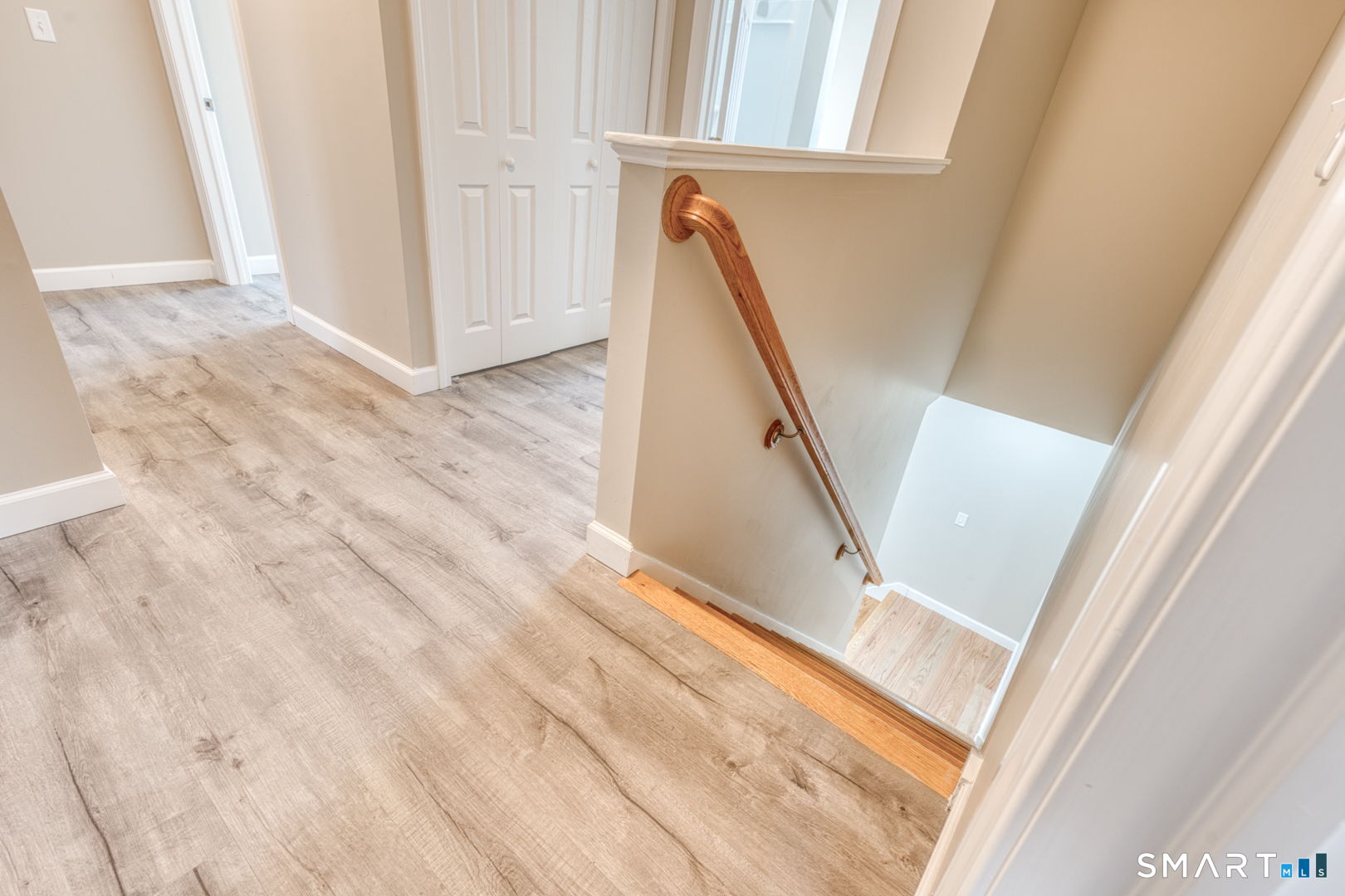 205 Winding Hollow Road Groton, CT 06340 - Photo 13 of 27 a view of an entryway with staircase
