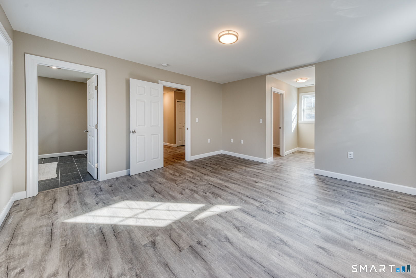 205 Winding Hollow Road Groton, CT 06340 - Photo 14 of 27 a view of empty room with wooden floor