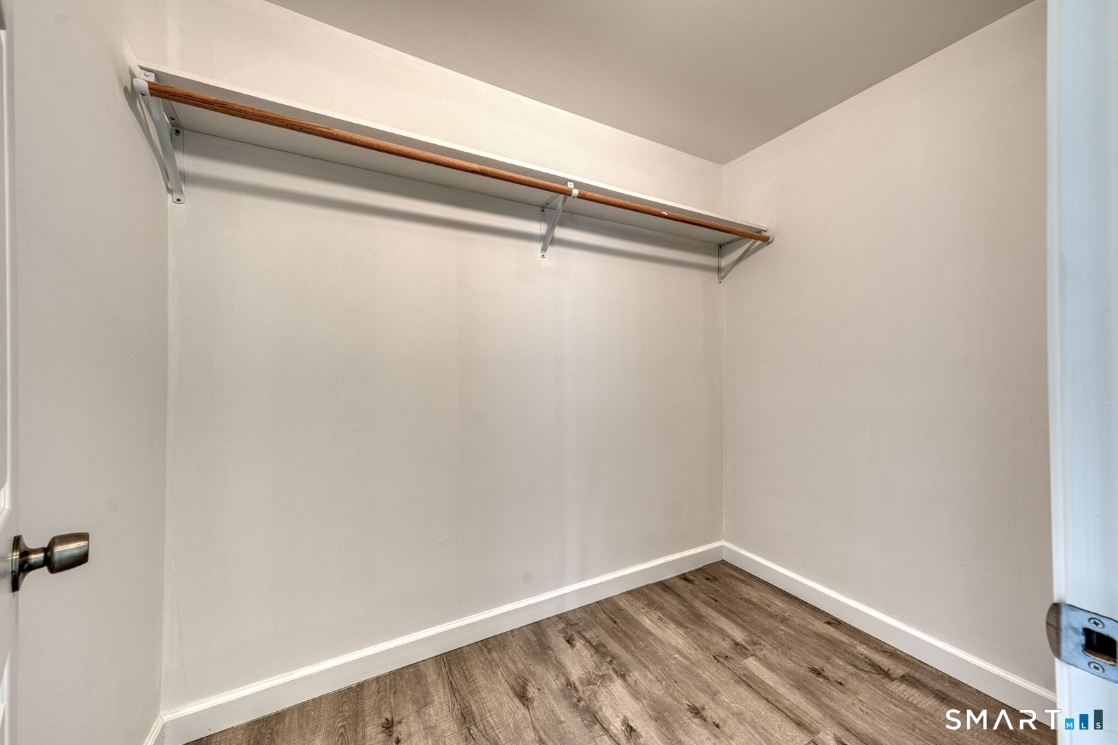 205 Winding Hollow Road Groton, CT 06340 - Photo 21 of 27 a view of a room with rack on the wall