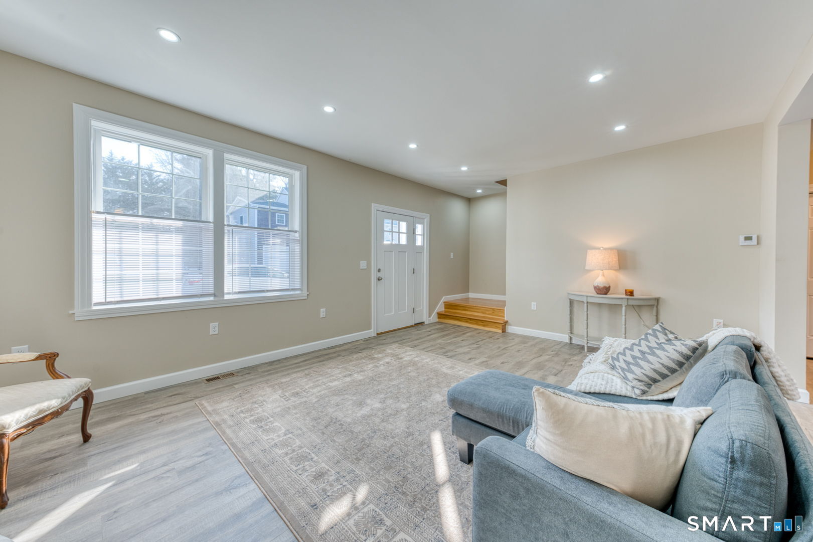 205 Winding Hollow Road Groton, CT 06340 - Photo 6 of 27 a living room with furniture and a window