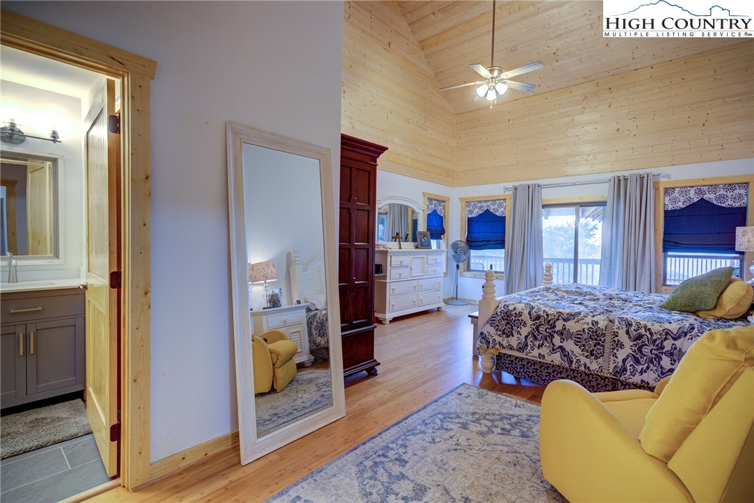 111 Boca Ridge Road Boone, NC 28607 - Photo 15 of 44 a living room with furniture and wooden floor