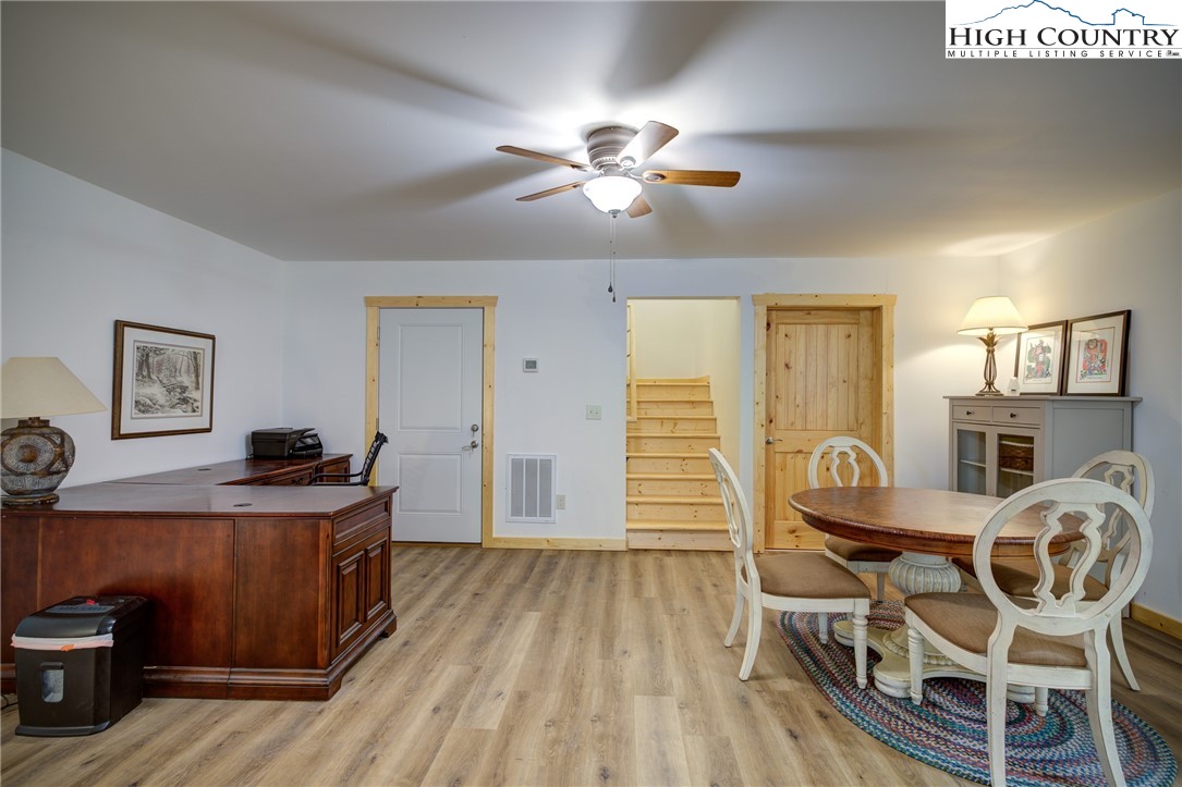 111 Boca Ridge Road Boone, NC 28607 - Photo 24 of 44 a view of a dining room with furniture and wooden floor