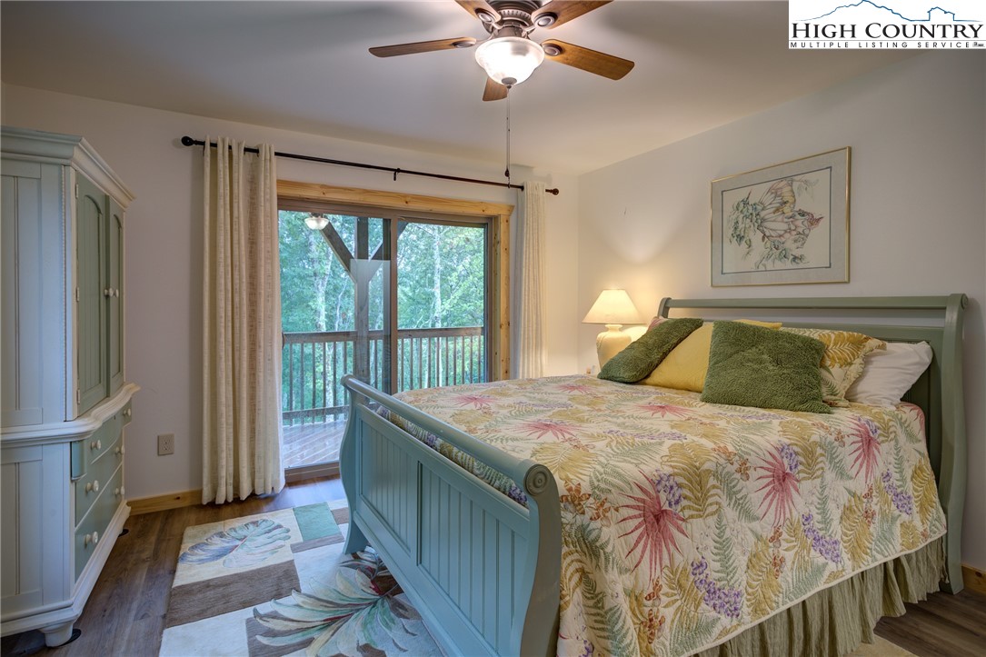 111 Boca Ridge Road Boone, NC 28607 - Photo 29 of 44 a bedroom with a bed and a window