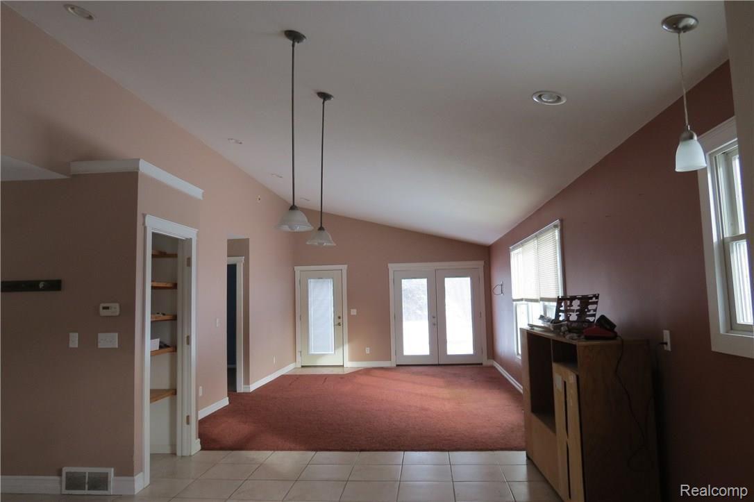 4210 5 Lakes Road North Branch, MI 48461 - Photo 24 of 40 LIVING ROOM/DINNING ROOM OPEN SPACIOUS CONCEPT