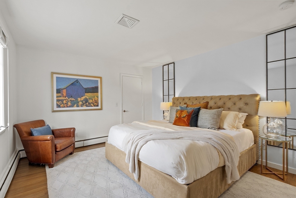 3 B Pelham Road Lexington, MA 02421 - Photo 19 of 41 a bedroom with bed and a couch