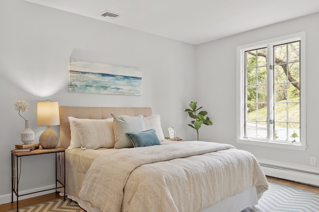 3 B Pelham Road Lexington, MA 02421 - Photo 21 of 41 a bedroom with a bed and a window