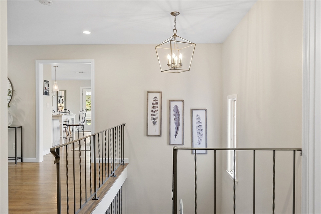 3 B Pelham Road Lexington, MA 02421 - Photo 24 of 41 a view of a hallway with windows