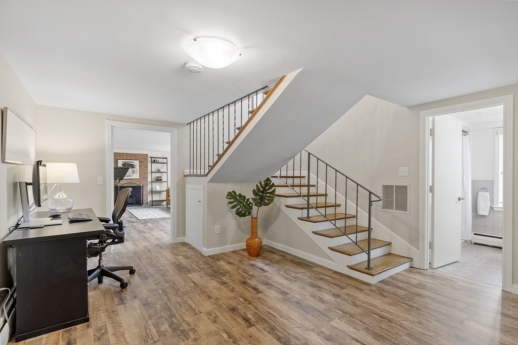 3 B Pelham Road Lexington, MA 02421 - Photo 25 of 41 a view of entryway and hall with wooden floor