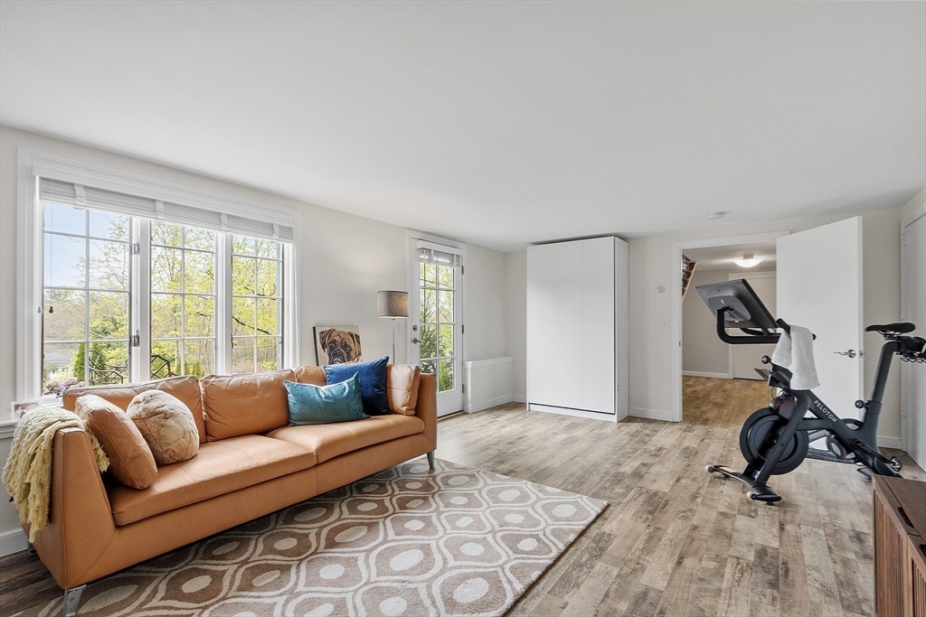 3 B Pelham Road Lexington, MA 02421 - Photo 29 of 41 a living room with furniture and a window
