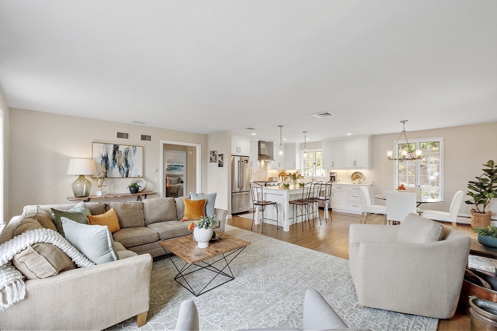 3 B Pelham Road Lexington, MA 02421 - Photo 8 of 41 a living room with furniture and view of kitchen