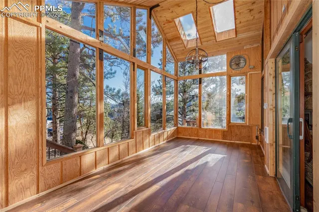 a view of an entryway with a chandelier