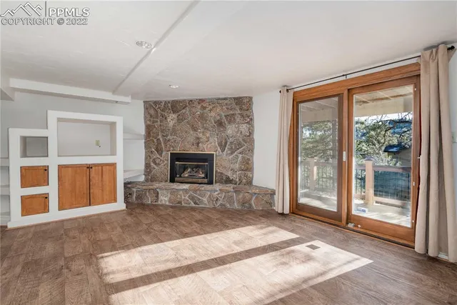 a view of a livingroom with a fireplace