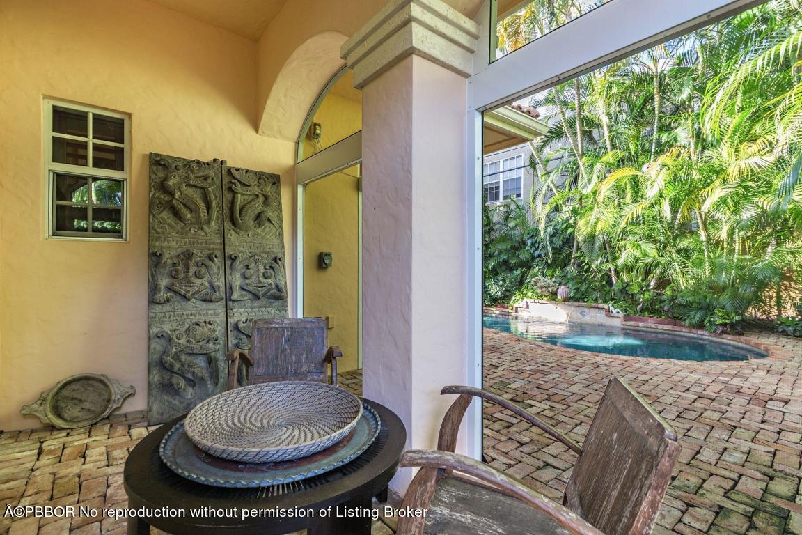 309 Valencia Road West Palm Beach, FL 33401 - Photo 18 of 24 a view of a porch with seating space