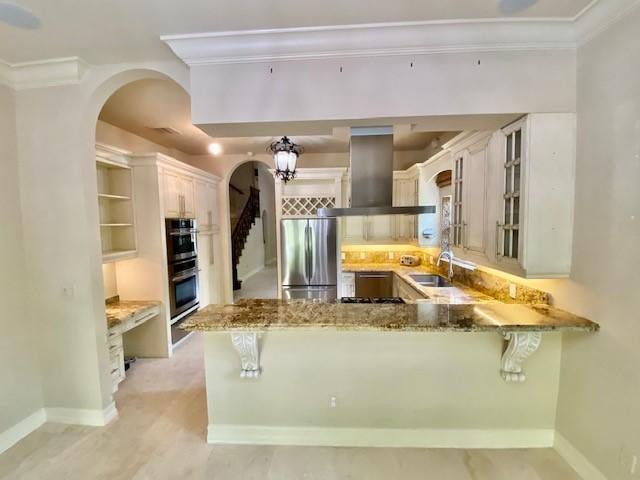 309 Valencia Road West Palm Beach, FL 33401 - Photo 5 of 24 a view of living room with granite countertop furniture and fireplace