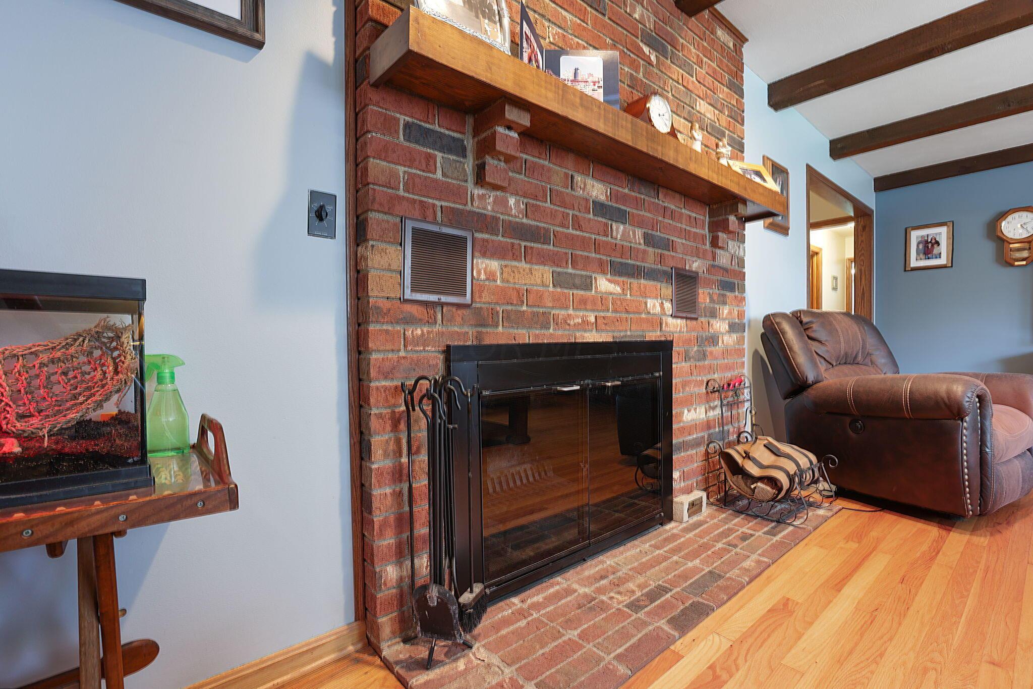 227 Middle Ground Road Southwest Pataskala, OH 43062 - Photo 21 of 83 Wood log fireplace