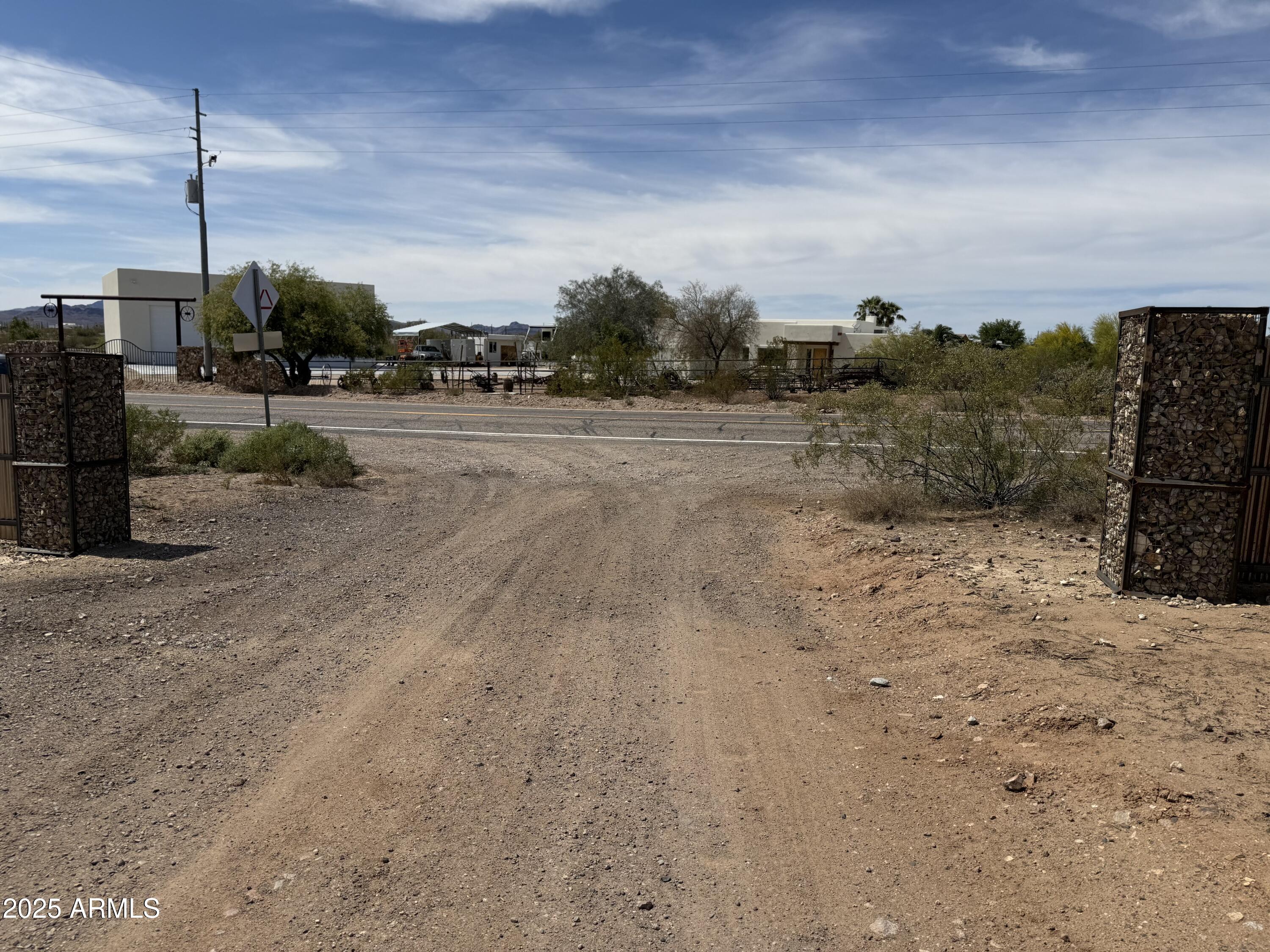 Xx00 North Castle Hot Springs Road Morristown, AZ 85342 - Photo 6 of 10 a view of a road with an ocean view