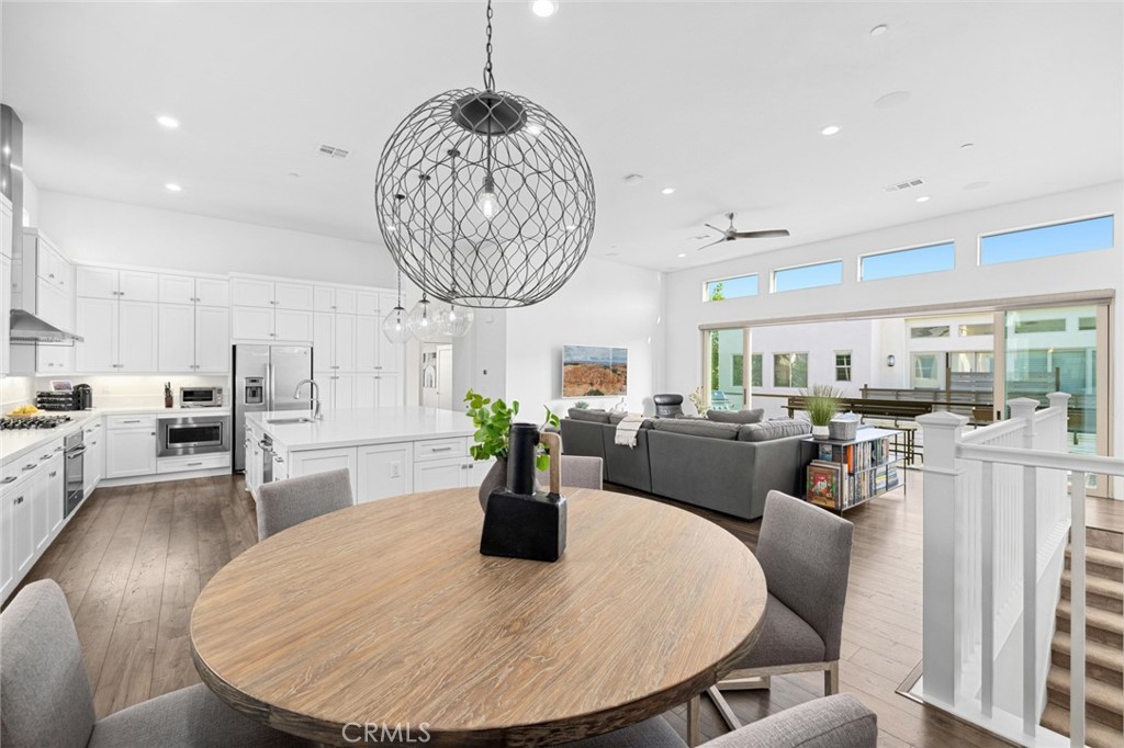 134 Stellar Irvine, CA 92618 - Photo 1 of 49 a view of a dining room with furniture window and wooden floor