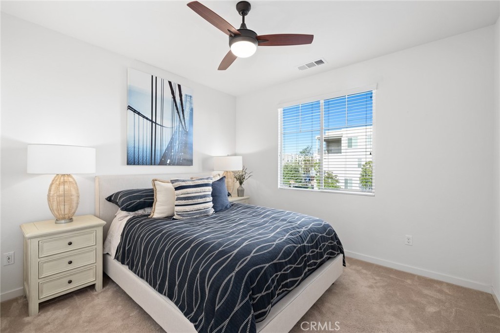 134 Stellar Irvine, CA 92618 - Photo 20 of 49 a bedroom with a bed and window