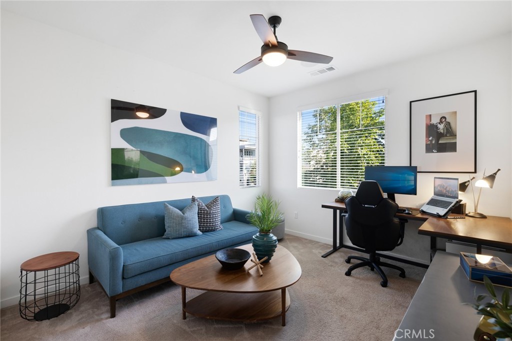 134 Stellar Irvine, CA 92618 - Photo 22 of 49 a living room with furniture and a potted plant