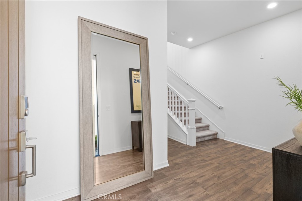 134 Stellar Irvine, CA 92618 - Photo 24 of 49 a view of entryway with wooden floor