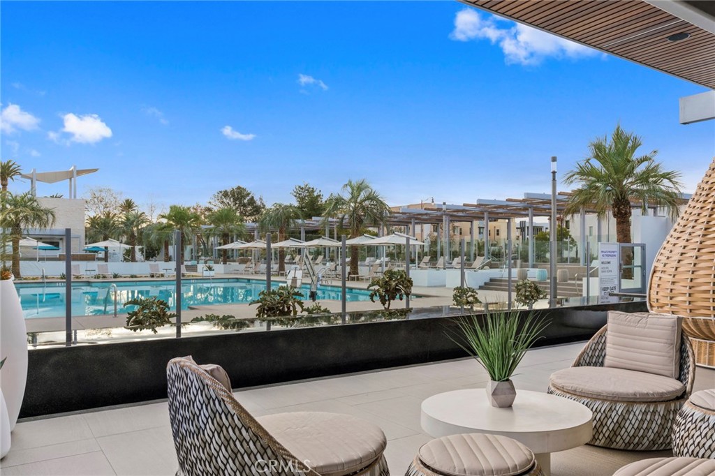 134 Stellar Irvine, CA 92618 - Photo 41 of 49 a view of a balcony with chairs and a patio