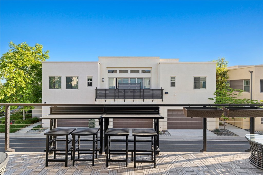 134 Stellar Irvine, CA 92618 - Photo 6 of 49 a view of a chairs and table on the wooden floor
