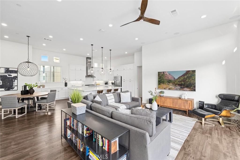 134 Stellar Irvine, CA 92618 - Photo 9 of 49 a living room with furniture and a flat screen tv
