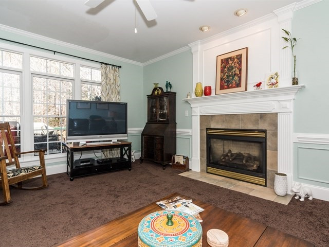8004 Millenium Drive Raleigh, NC 27614 - Photo 13 of 24 Cozy family room w/ great space and gas log fireplace. Den/Family/Great Room