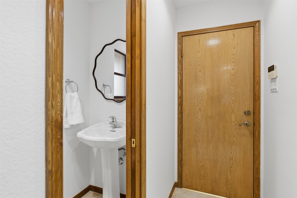 3311 Squirrel Hollow Austin, TX 78748 - Photo 27 of 40 Convenient powder room near kitchen and laundry room